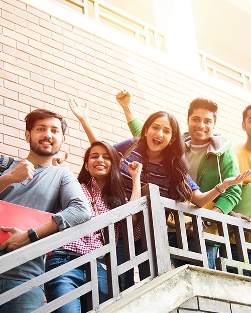 Excited group of students on campus